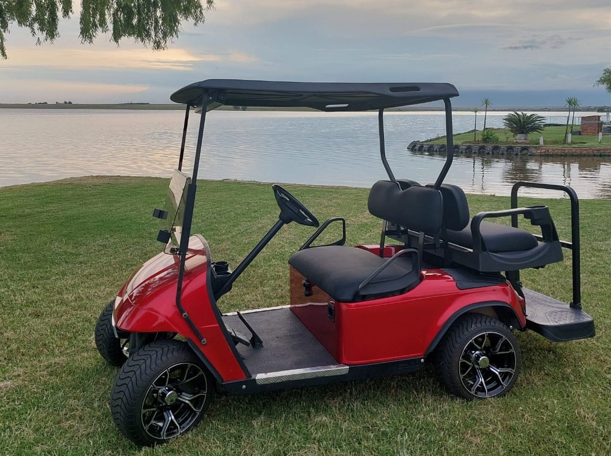 Refurbished red golf cart supplied by Golf Car Battery Suppliers